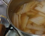 A picture of step 4 of Kimchi Hotpot with Kimchi Stock.