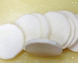 A picture of step 1 of Pork-Wrapped Daikon Radish with Yakiniku Sauce.