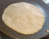 A picture of step 4 of Aamras and double layered Rotli.