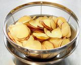 A picture of step 3 of Easy! Tasty! Sweet Potato Chips.