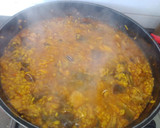 Foto del paso 6 de la receta: Arroz con pollo y caracoles