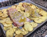 Foto del paso 4 de la receta Costillar al horno con patatas al ajillo