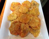 A picture of step 2 of Tostones (Patacones) with Green Garlic Sauce.