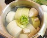 A picture of step 4 of Daikon Radish Simmered with Scallops.
