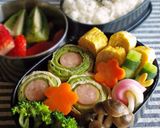 A picture of step 7 of Rolled Cabbage with Fried Tofu and Wiener Sausages.