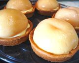 A picture of step 30 of Cream Cheese Custard Peach Tarts.