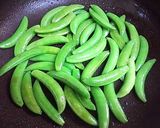 A picture of step 4 of Stir-Fried Sugar Snap Peas With My Secret Sauce.