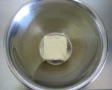 A picture of step 1 of Striped No-Bake Cheesecake.