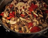 A picture of step 2 of Ragout of Mixed Mushrooms, Roasted Red Peppers and Cannellini Beans over Garlic-Parmesan Grits.