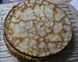 A picture of step 7 of Strawberry, Kiwi, and Peach Mille Crêpes Cake.