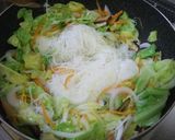 A picture of step 8 of Stir-fried Bifun Noodles with lots of Spring Cabbage and Sweet Onions.