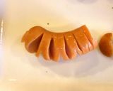 A picture of step 4 of Bear & Flower Bento with 1 Wiener Sausage.