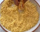 A picture of step 3 of Monaco biscuits stuffed sev puri.