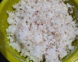 A picture of step 1 of Coconut fritters deep in sugar syrup.