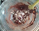A picture of step 2 of Pomegranate and coconut flakes Dark chocolate bark.