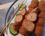 A picture of step 2 of Chicken Ball n sausage Pita roll.