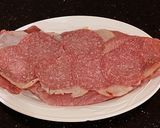 A picture of step 4 of Pork Tenderloin Stuffed with Italian Meats.