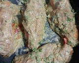 A picture of step 4 of Cheesy Spicy Chicken with stuffing.