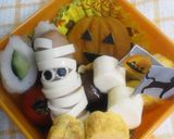 A picture of step 4 of Mummy Sausages for Halloween Bento.
