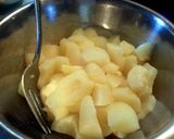 A picture of step 9 of crumble topped pear pie.