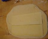 A picture of step 3 of Easy Cinnamon Rolls with Puff Pastry.