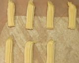 A picture of step 5 of Chocolate hazelnut churros.