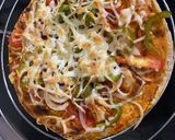 A picture of step 6 of Chapati cheese burst pizza rotzza.
