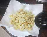 Foto del paso 8 de la receta: Habichuelas compuestas con carne de cochino, papas fritas y huevo duro