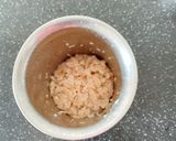 A picture of step 2 of Red Poha Cup Puttu.