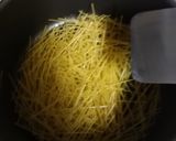 A picture of step 1 of Fried Anglehair and Eggs.