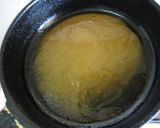 A picture of step 4 of Pan Fried Avocado with Caramel Sauce.