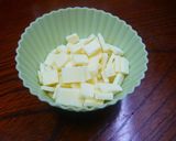 A picture of step 3 of How To Dice Cheese without Clumping.