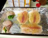 A picture of step 2 of Tilapia Wrapped Spinach.