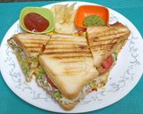 A picture of step 7 of Schezwan Cheese Toast Sandwich (A Mumbai road-side delight).