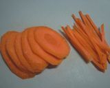 A picture of step 2 of Comforting Simmered Daikon Radish, Carrot and Aburaage.