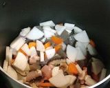 A picture of step 6 of Kenchin Soup with Tofu, Chicken & Dried Shiitake Mushrooms.