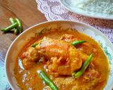 A picture of step 10 of Prawn Malai Curry.