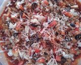 A picture of step 3 of Chicken tikka pizza.