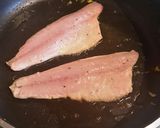 A picture of step 8 of Pan fried seabass fillets on a bed of citrus broccoli.