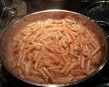 A picture of step 4 of Mexi style tomato soup pasta bake.