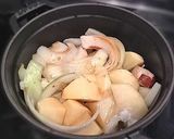 A picture of step 4 of Waterless Nikujaga (Simmered Meat and Potatoes) in a Staub Cocotte.