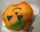 A picture of step 8 of Stuffed Bell Peppers for Halloween.