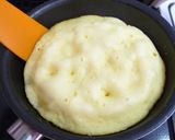 A picture of step 10 of Sweet Potato Cake using a Frying Pan and Pancake Mix.