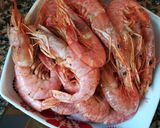 Foto del paso 7 de la receta Paella mixta de conejo y marisco en barbacoa