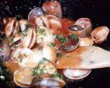 A picture of step 5 of Kanya's Clams in Sriracha double hot sauce :).