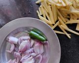 A picture of step 1 of Potato, Onion Fry.