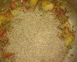 A picture of step 4 of Daliya khichdi with curd,papad and chutney.
