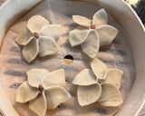 A picture of step 13 of Flower-Folded Siu Mai.