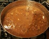 A picture of step 8 of Sausage and Mushroom Pasta in a Parmesan Cream.