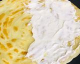 A picture of step 3 of Malabar paratha chicken sandwich.